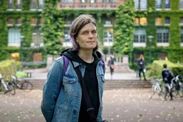 a person in front of a building.